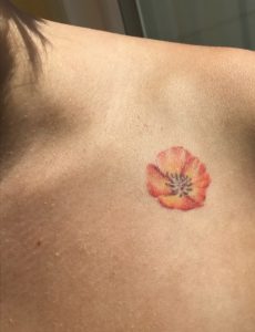Golden poppy tattoo